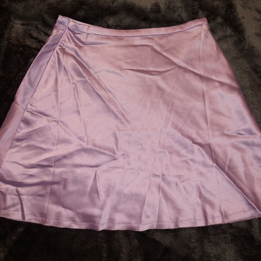 Brand new/never worn. Lavender silky skirt